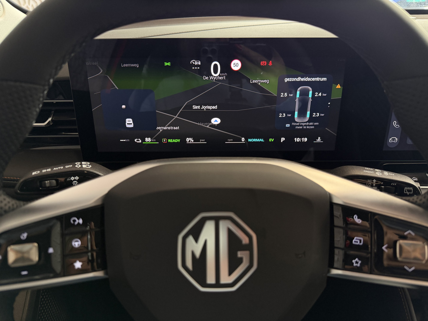 MG