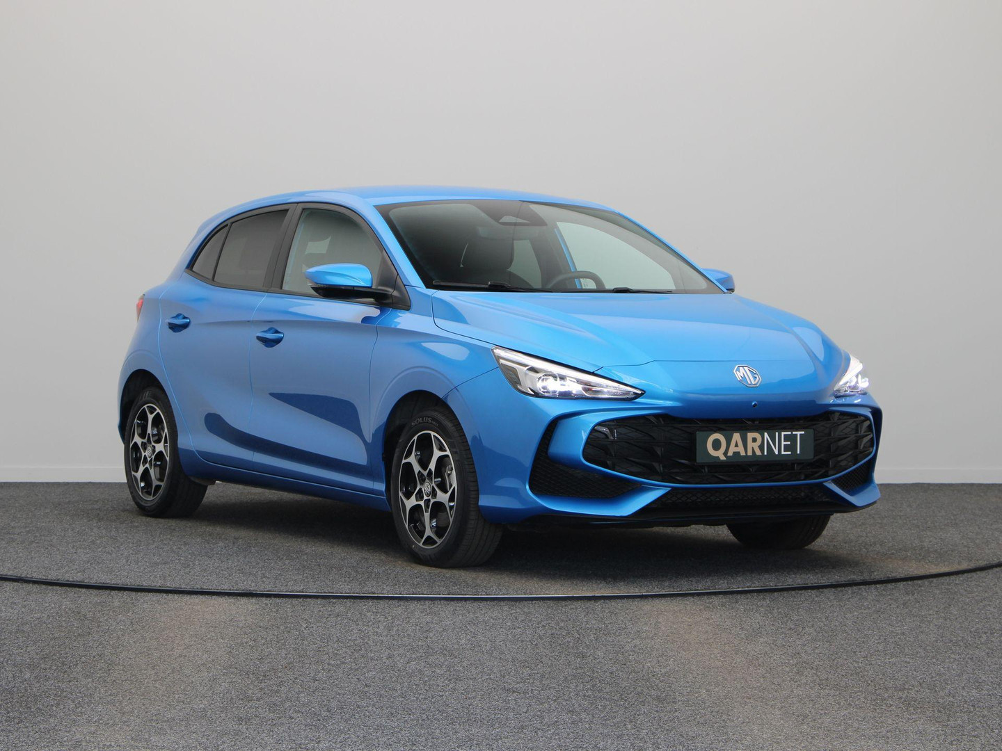 MG