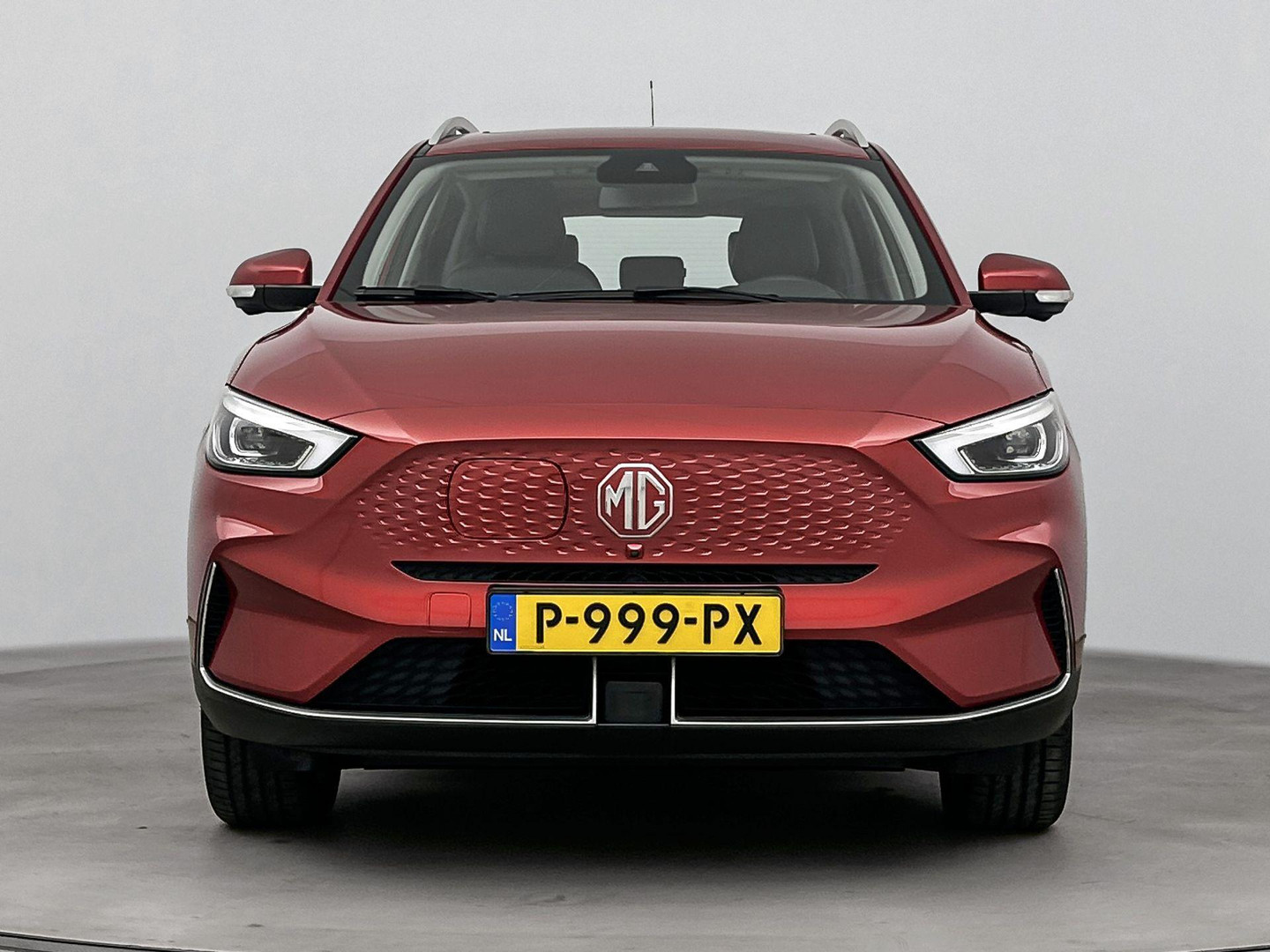 MG