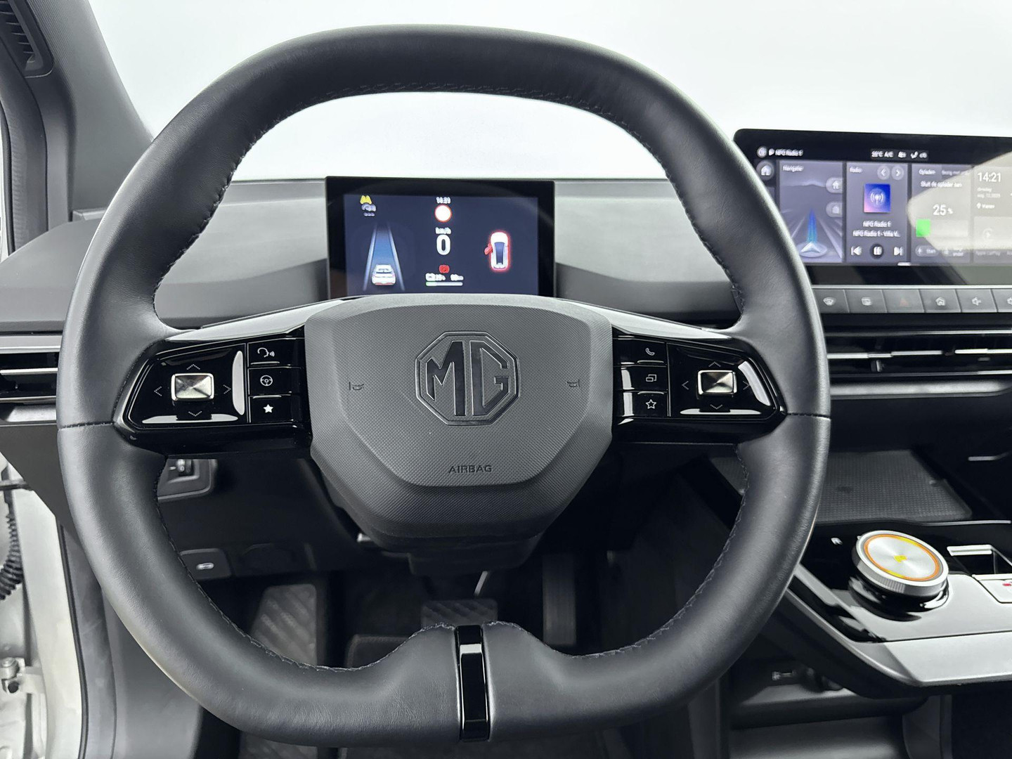 MG