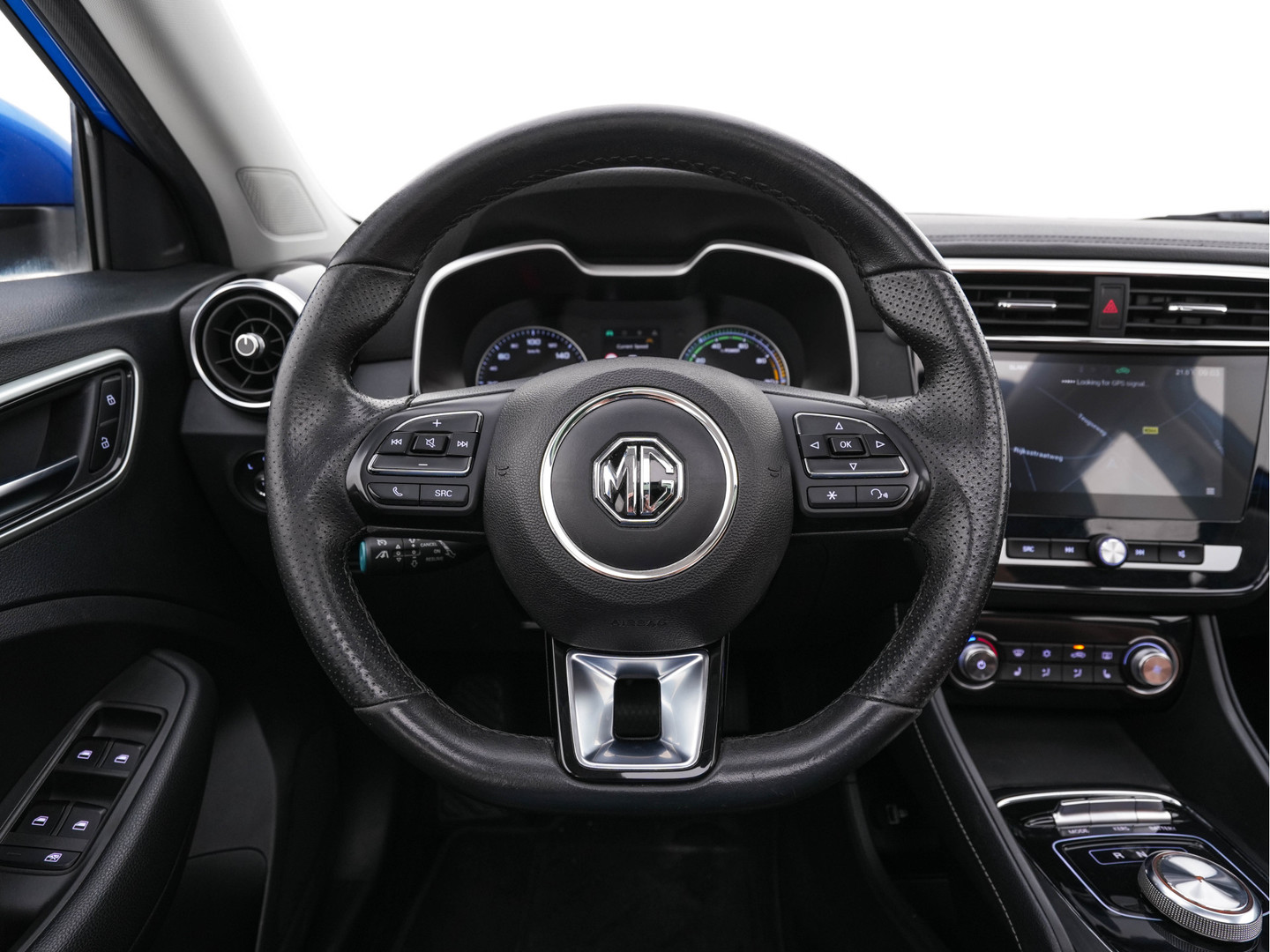 MG