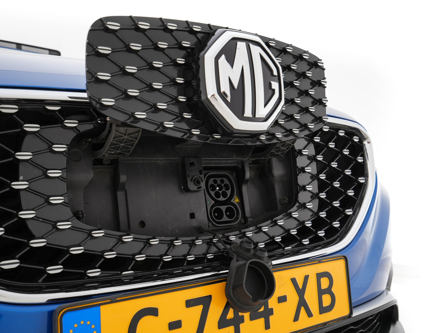 MG