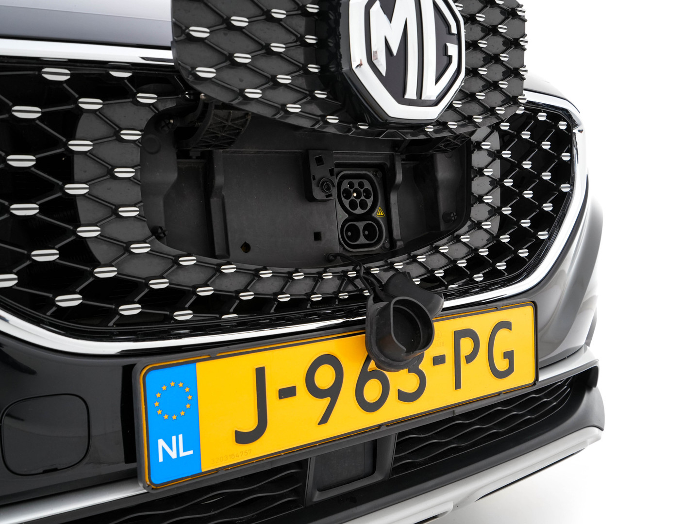 MG