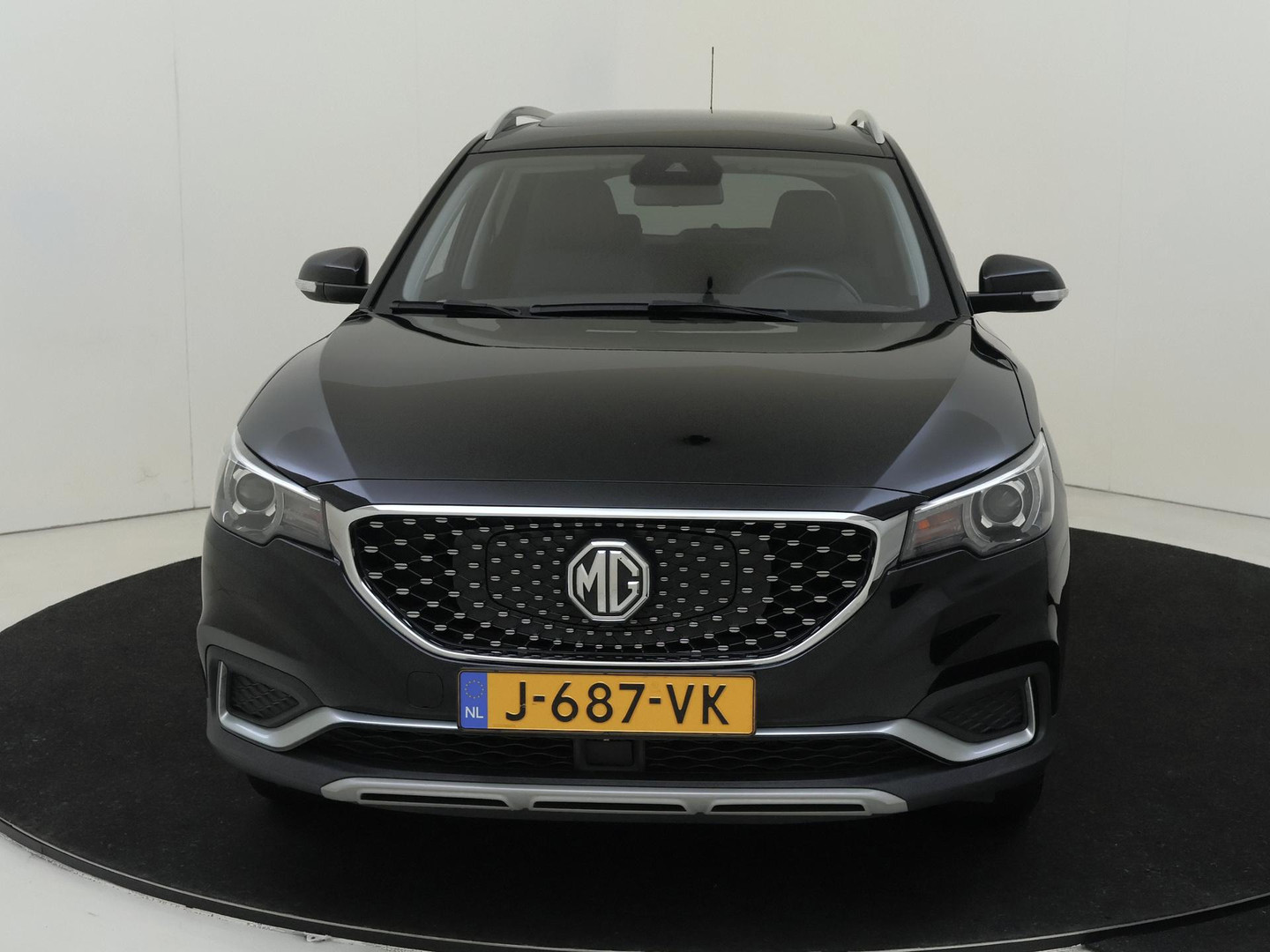 MG