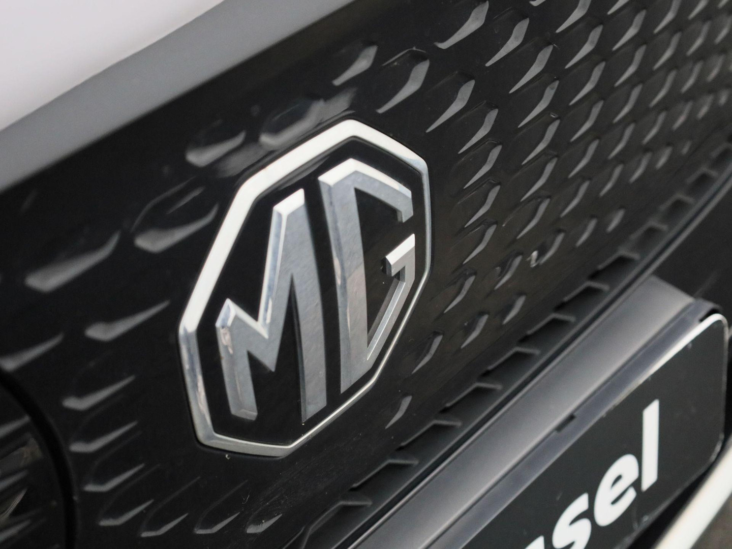 MG