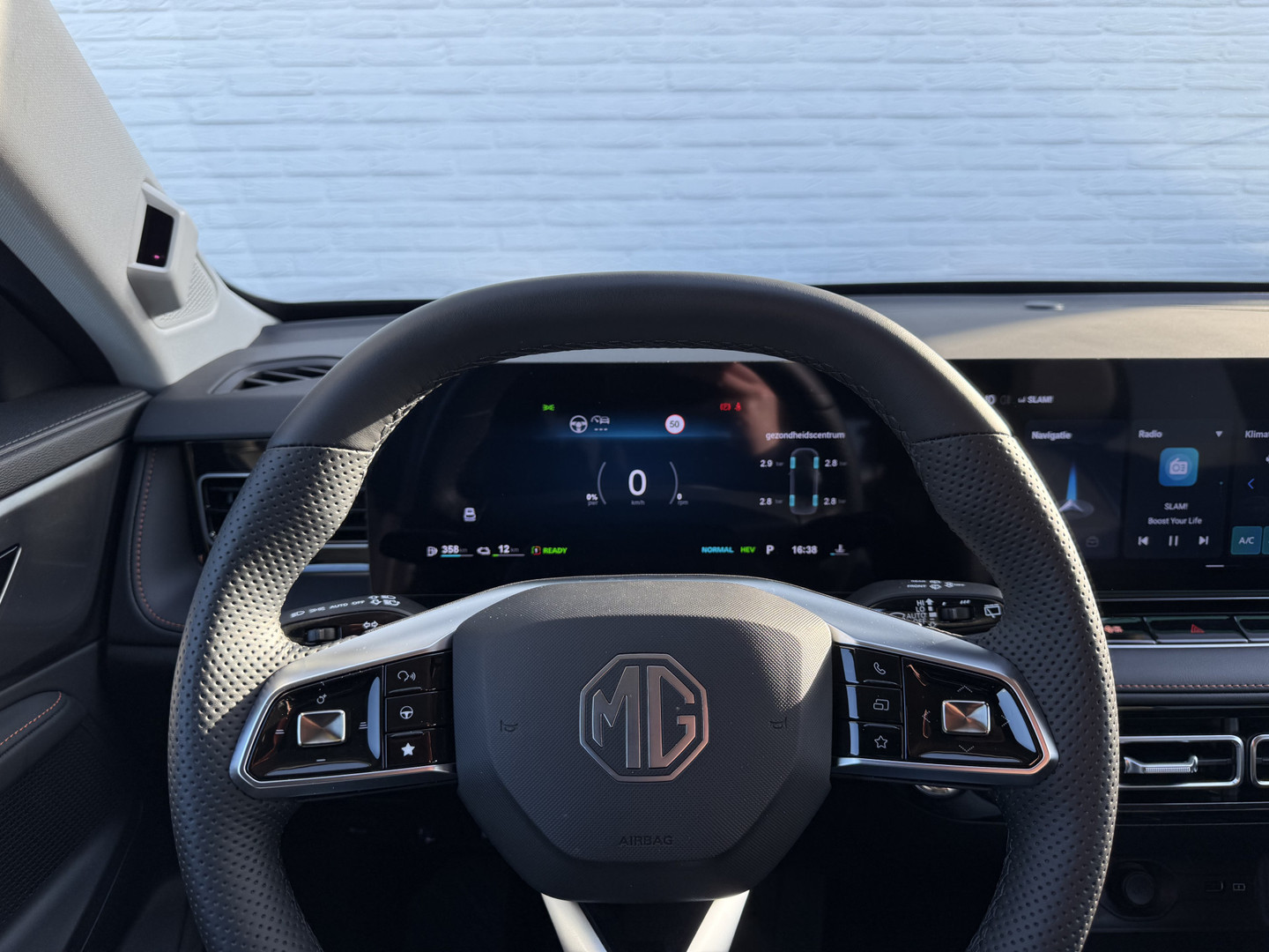 MG