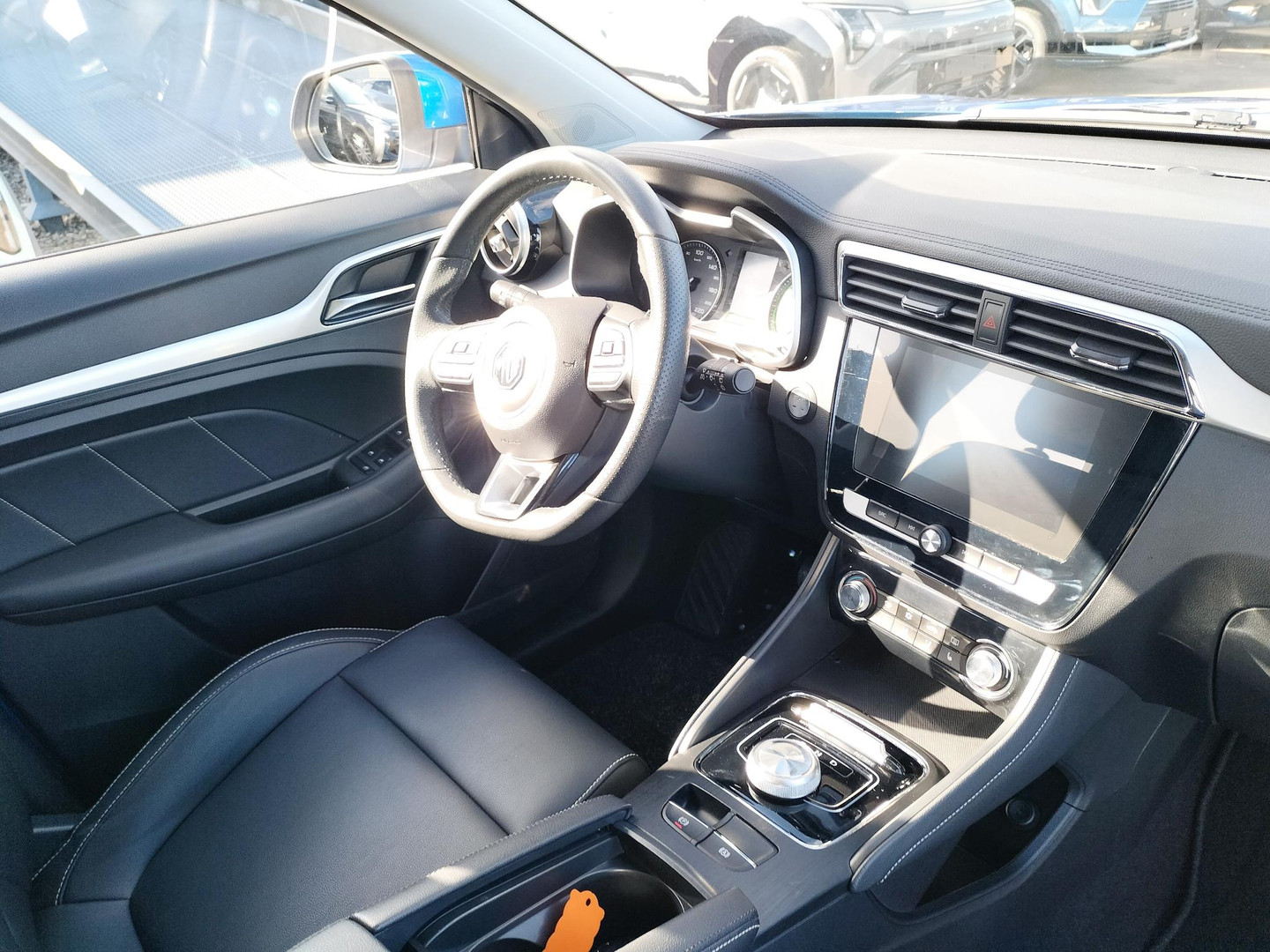 MG