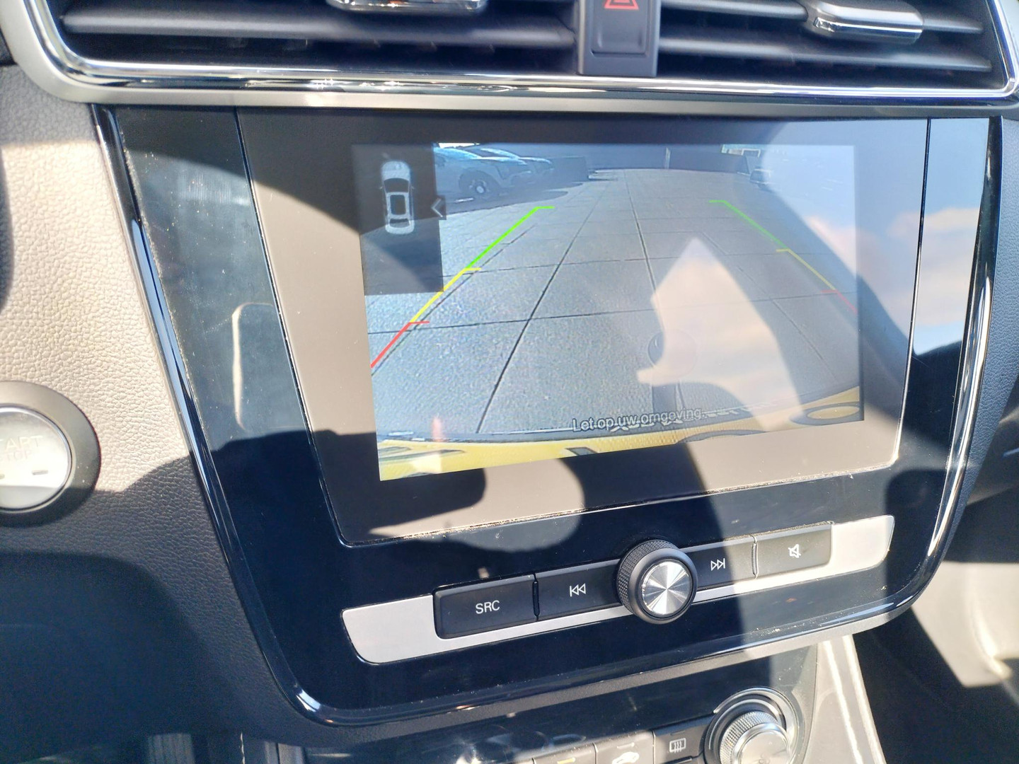 MG