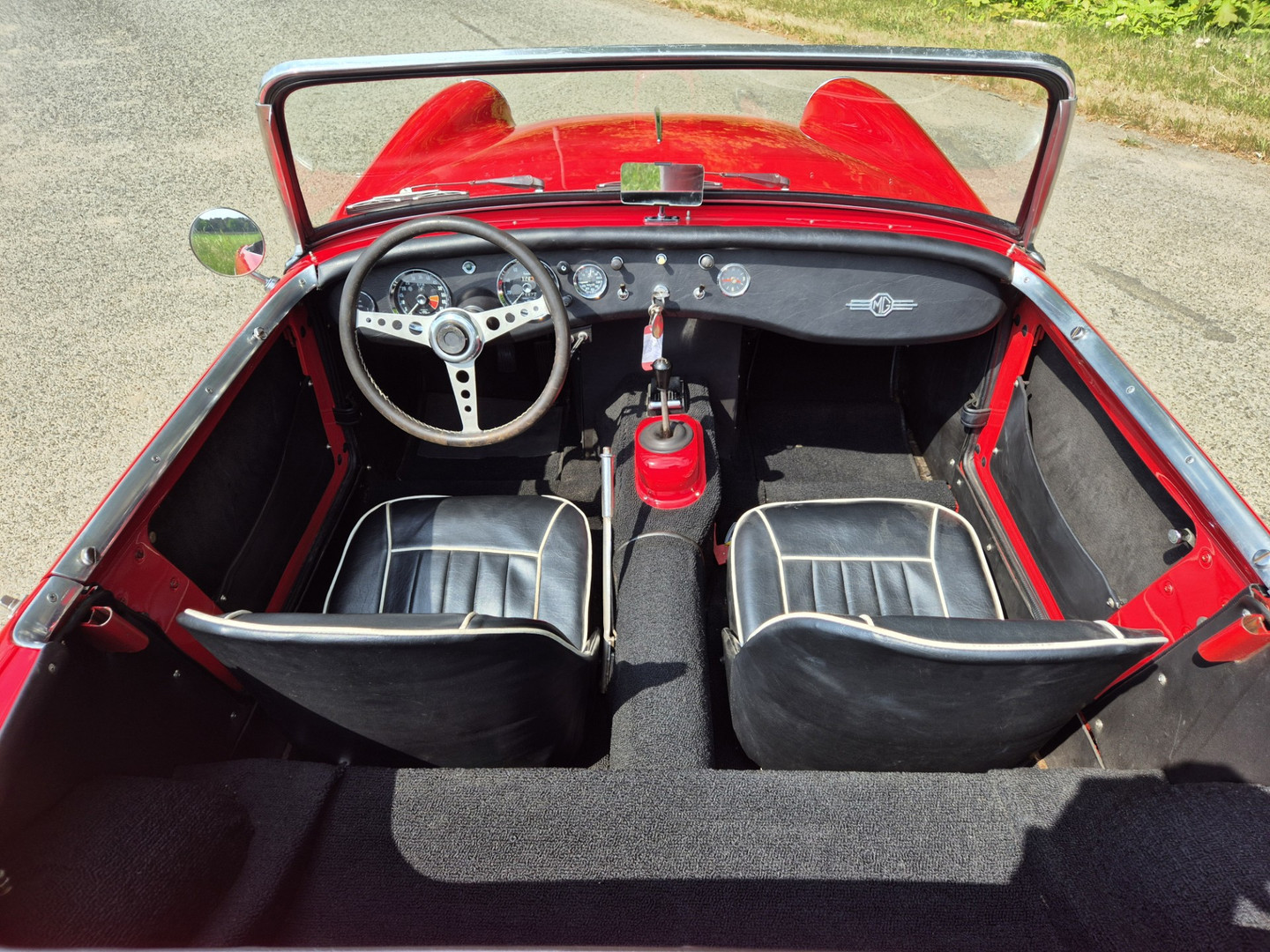 MG