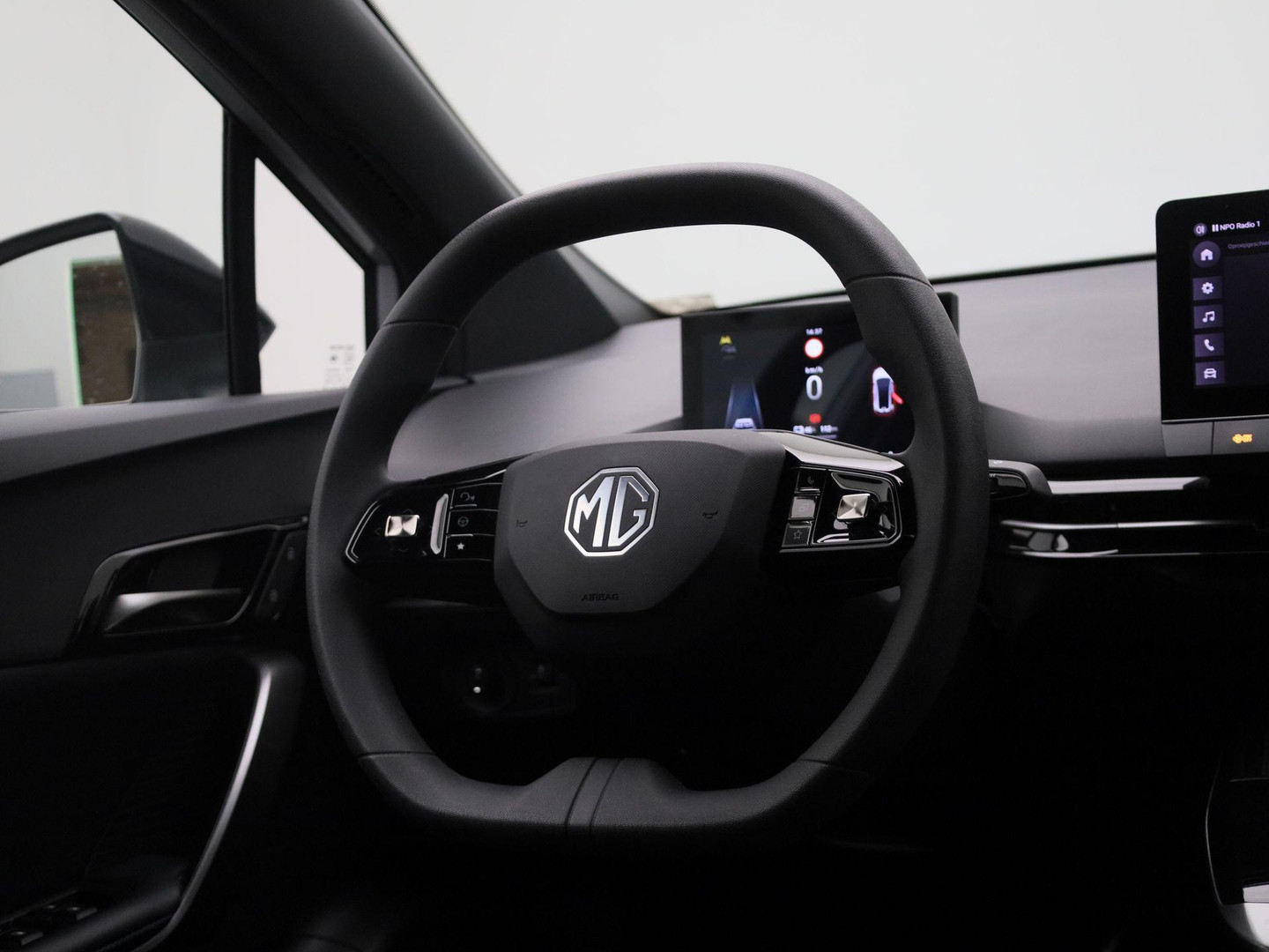 MG