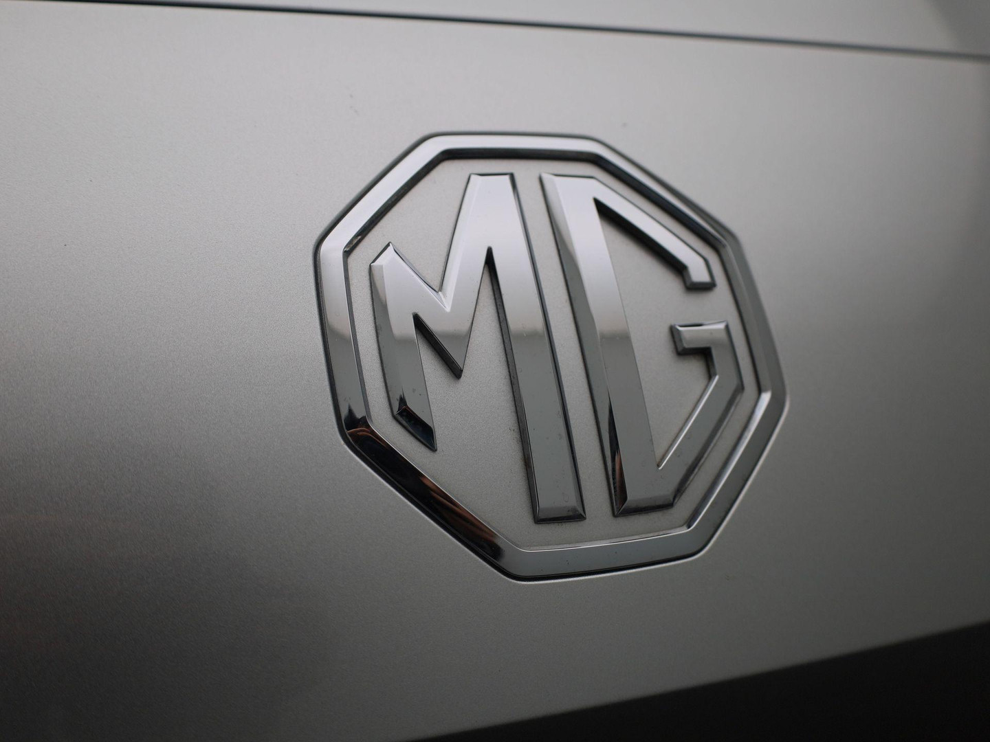 MG