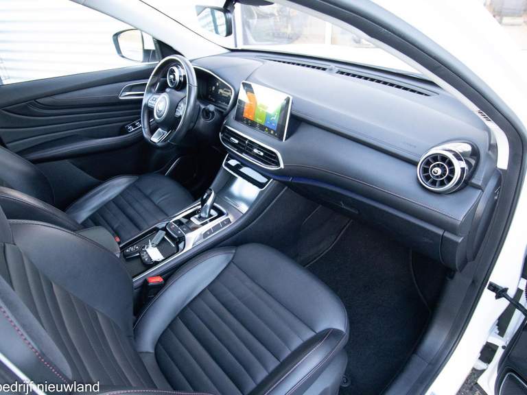 MG