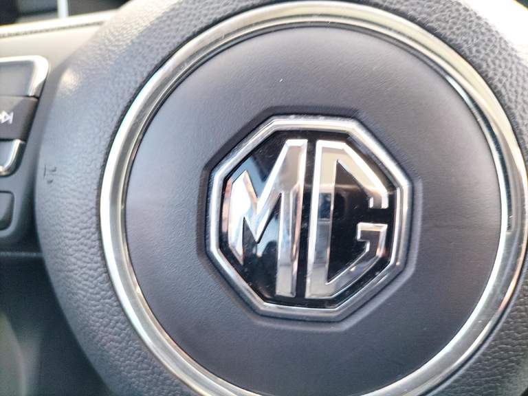 MG