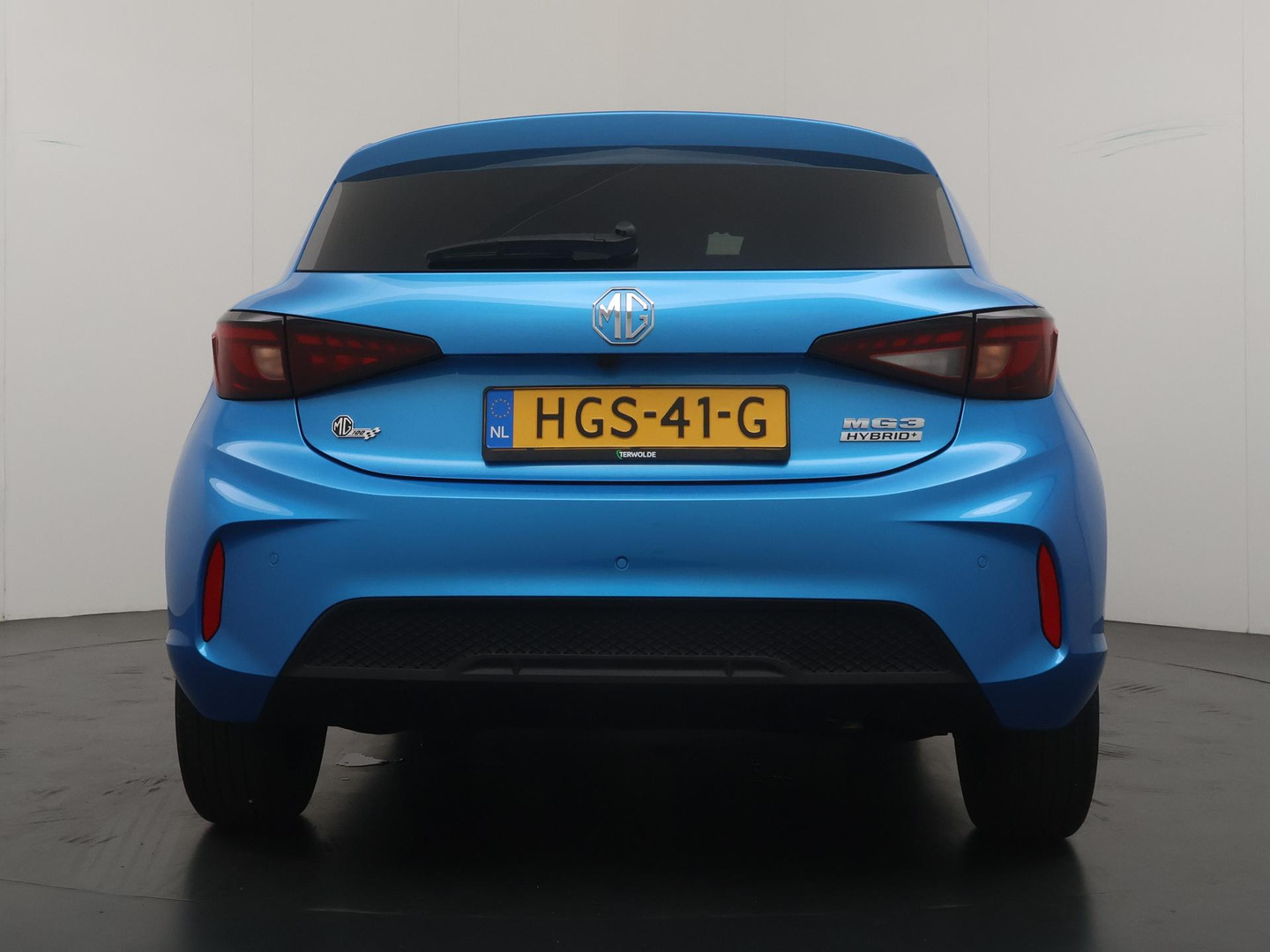 MG