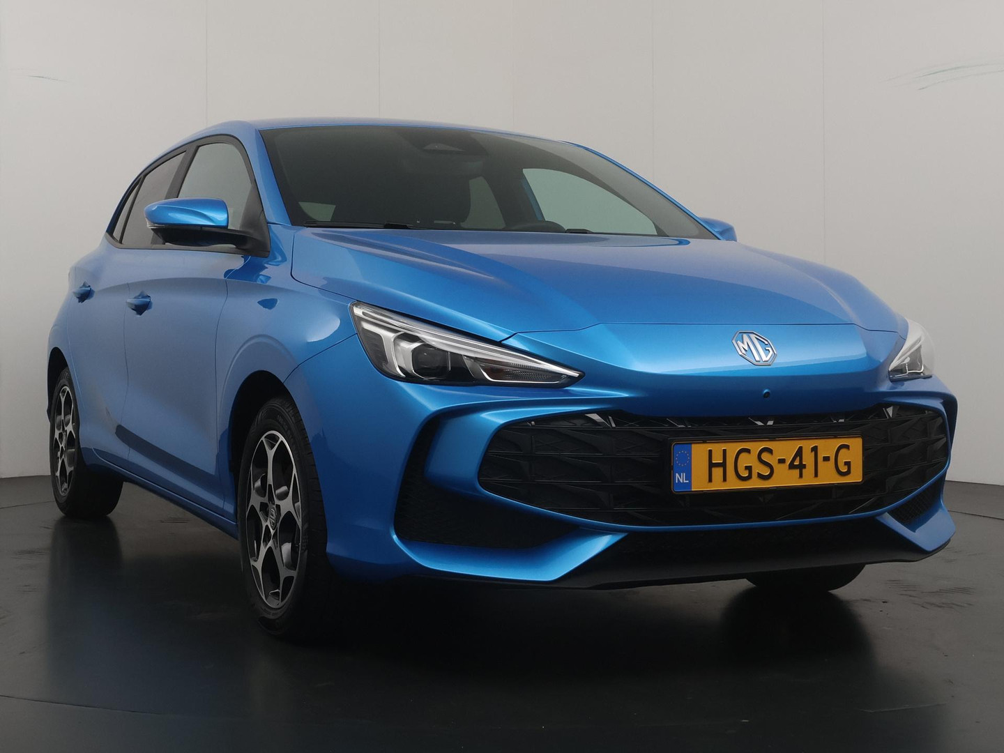MG