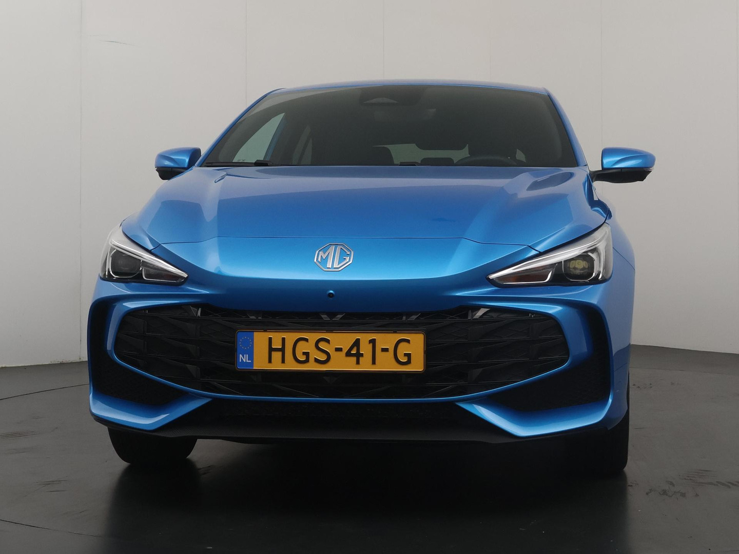 MG