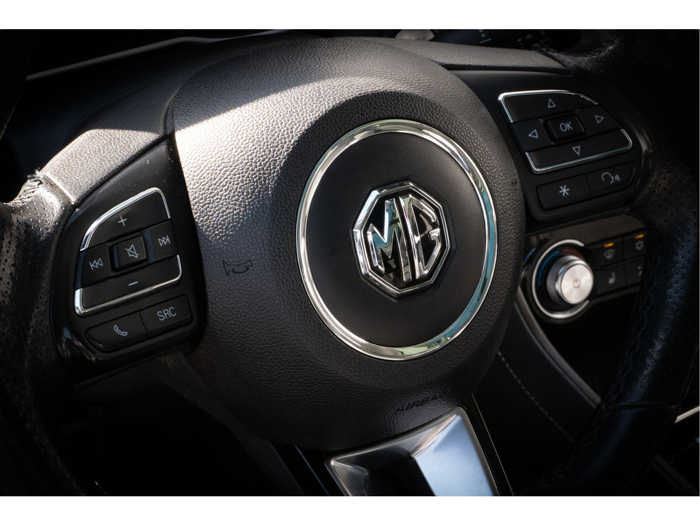 MG