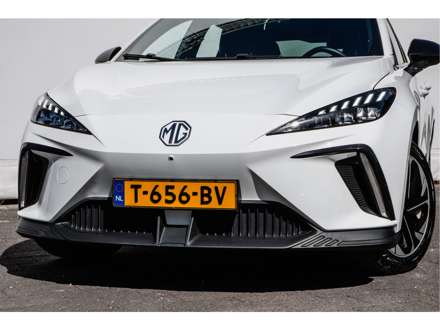 MG