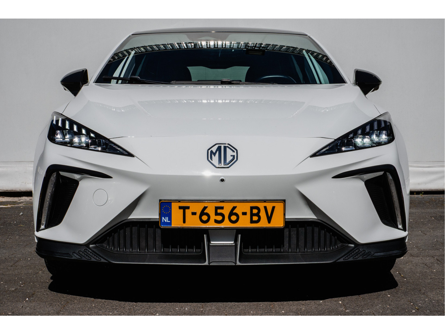 MG